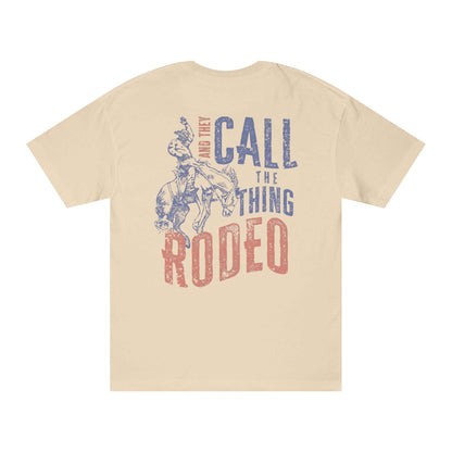 Rodeo Western Cowboy T-Shirt featuring a vintage print and cowboy graphic on the back in faded red and blue.