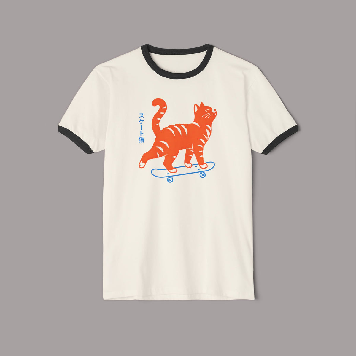 Skateboarding Cat Ringer T‑Shirt — Retro Orange Tabby Skate Tee