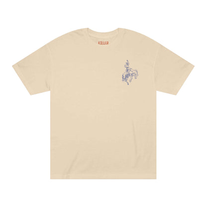 Alt Tag: rodeo western cowboy t-shirt in cream with small cowboy-on-horse chest graphic, classic short-sleeve western rodeo tee