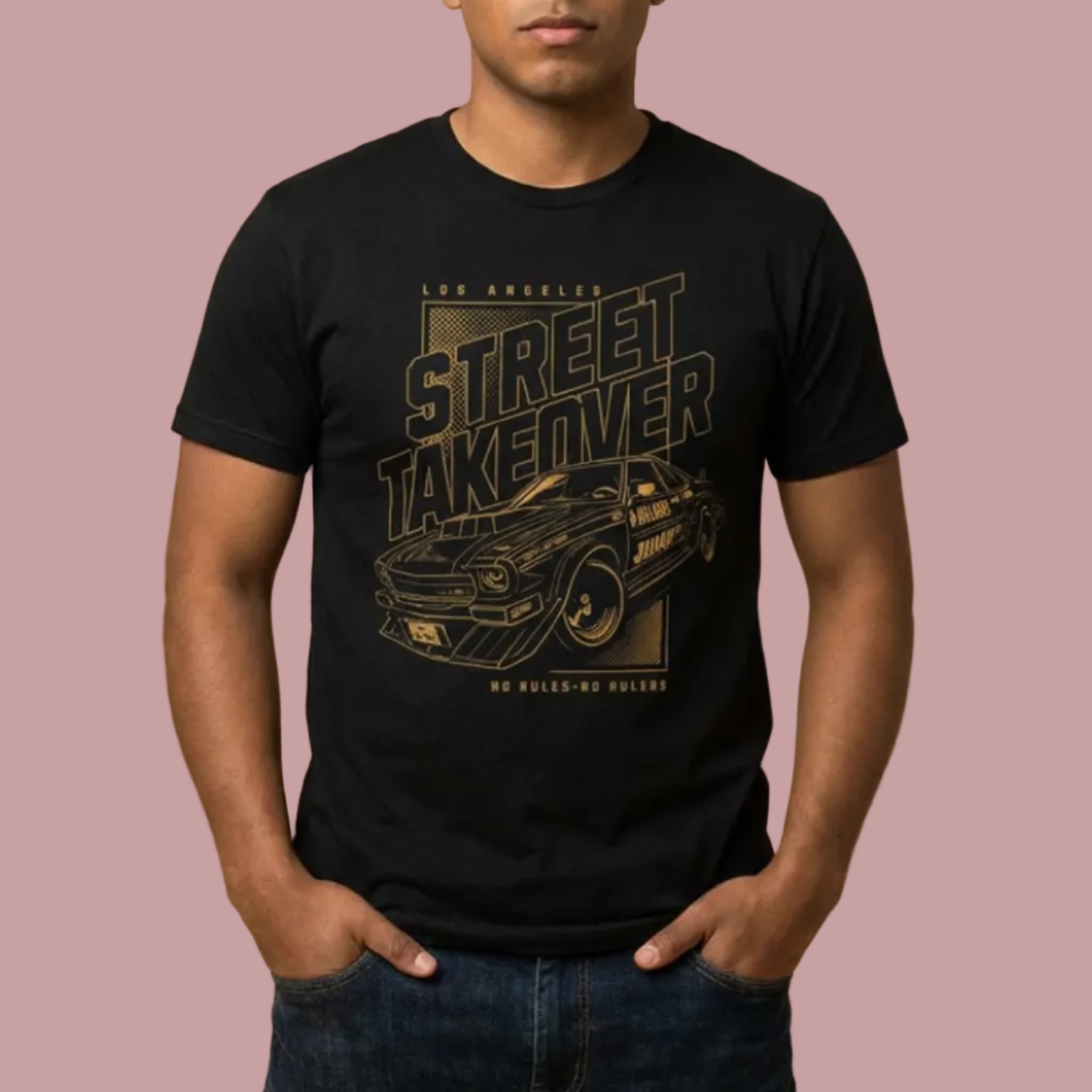 Man wearing a black t-shirt with a graphic design on a beige background