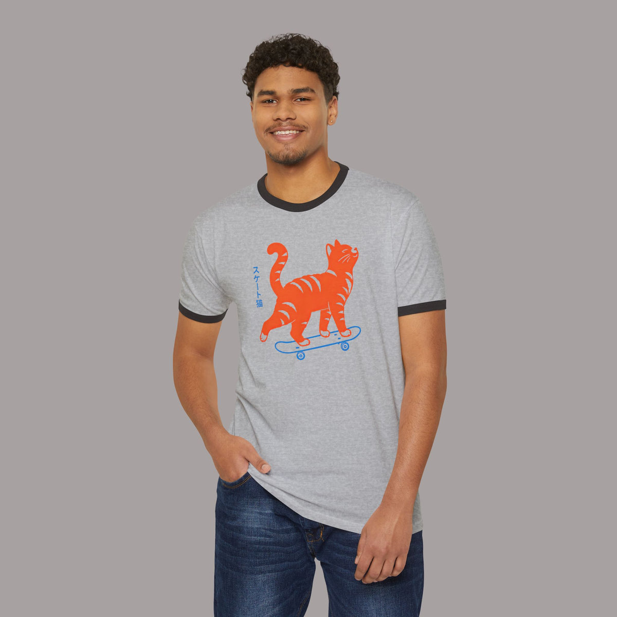 Skateboarding Cat Ringer T‑Shirt — Retro Orange Tabby Skate Tee
