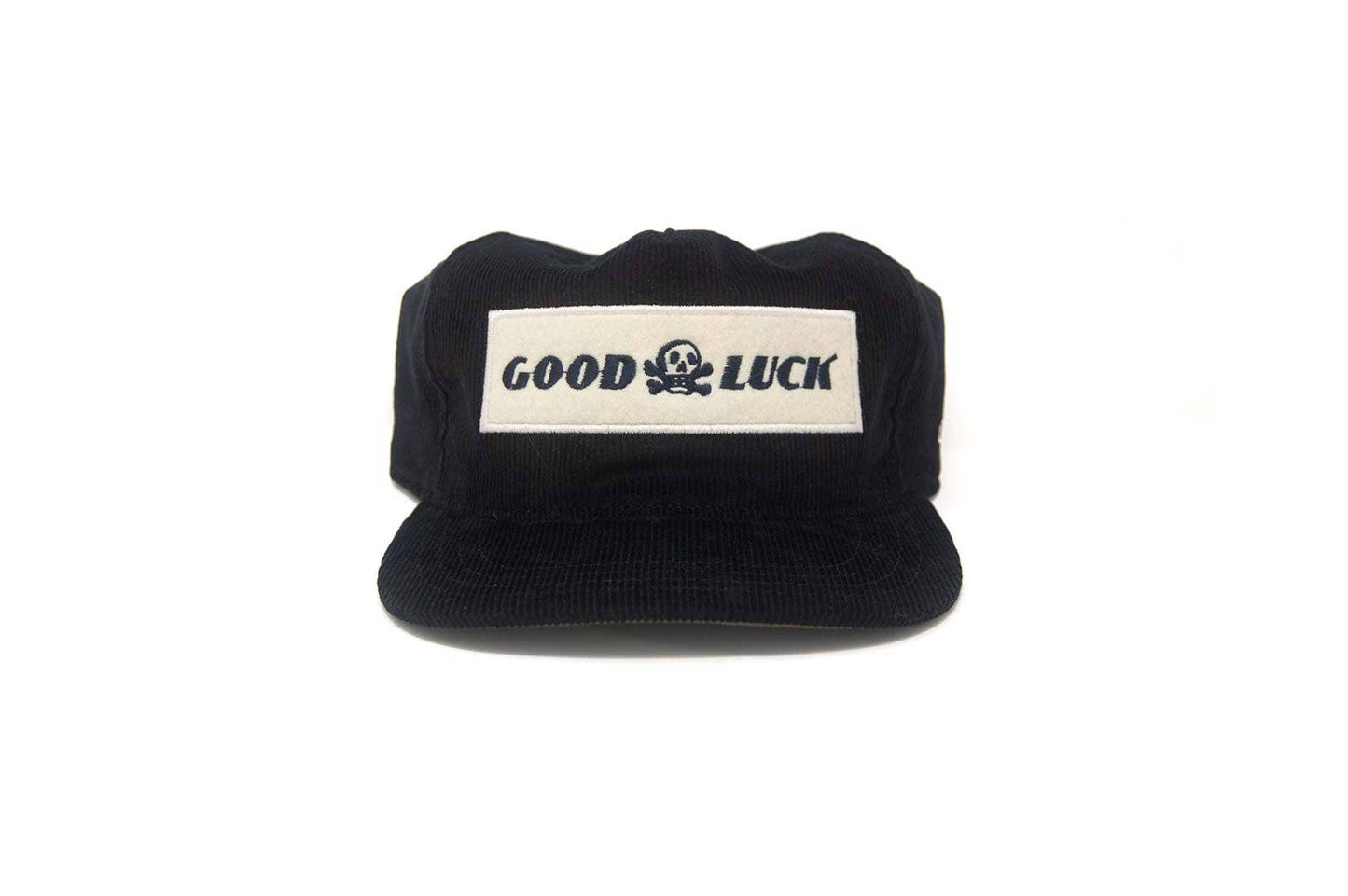 Black cap with 'Good Luck' label on a white background