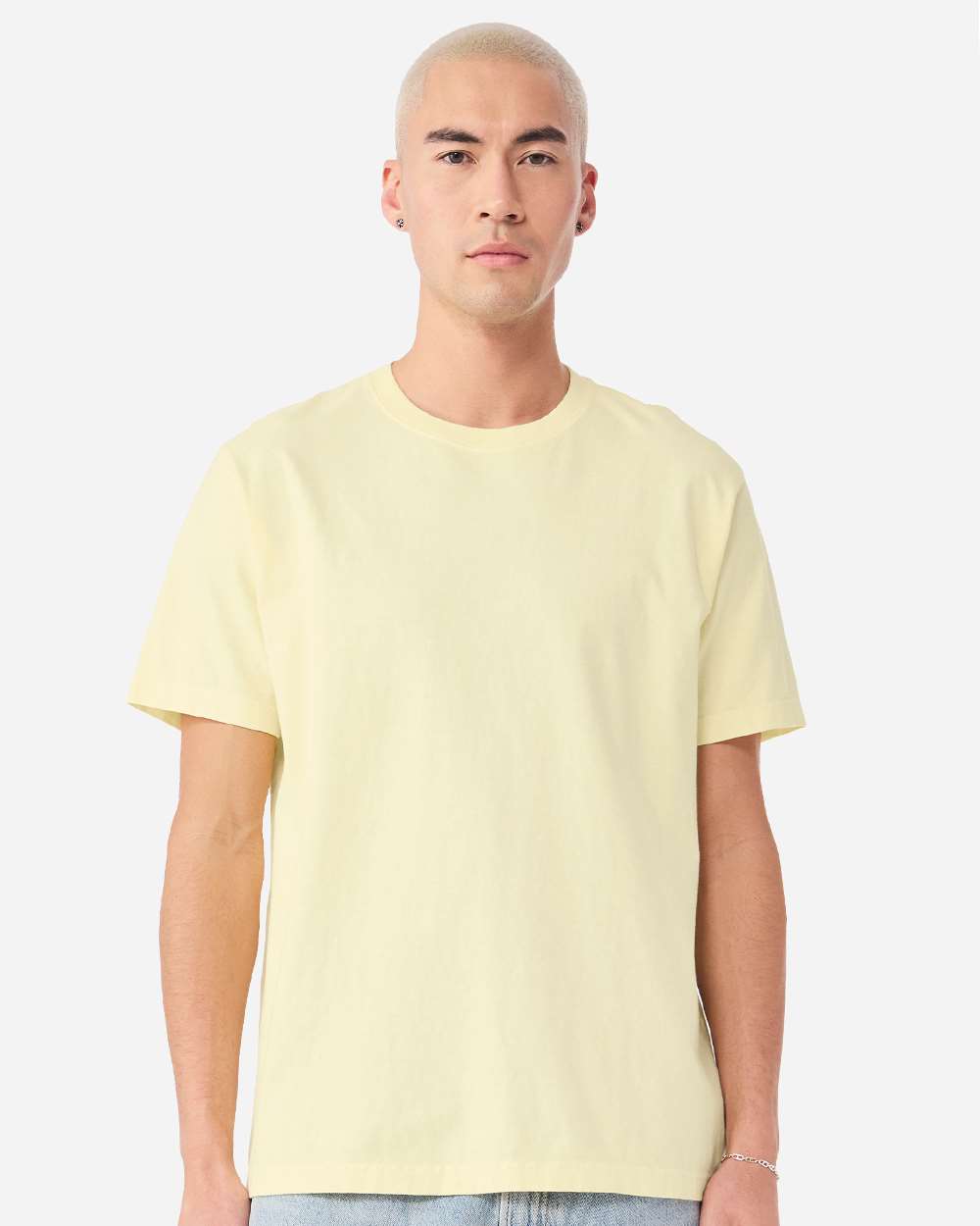 unisex heavyweight washed cotton t-shirt in pale yellow, relaxed fit crewneck tee on model, durable ring-spun cotton