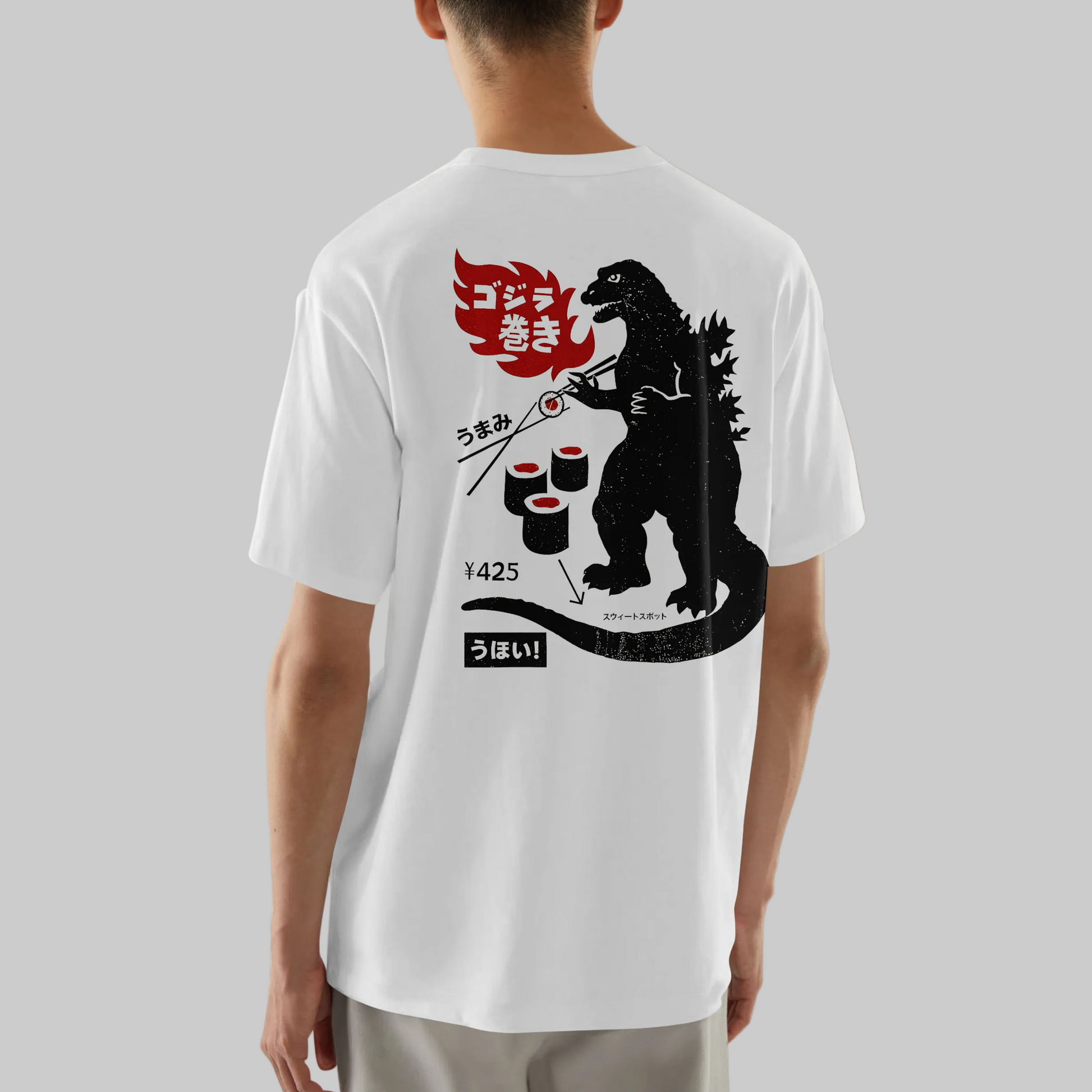 Person wearing a white t-shirt with a graphic design on the back, featuring a character eating sushi.