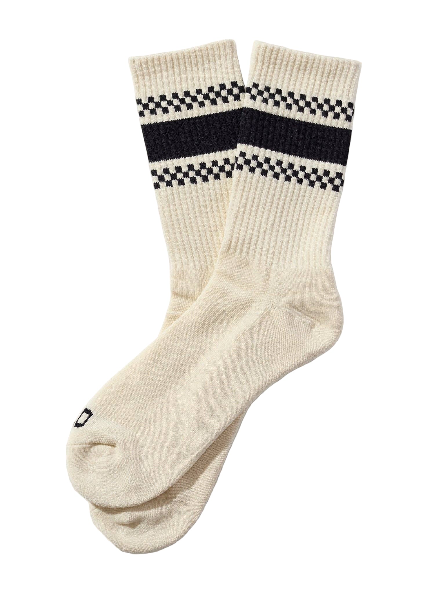 White socks with black and white checkered stripes on a beige background