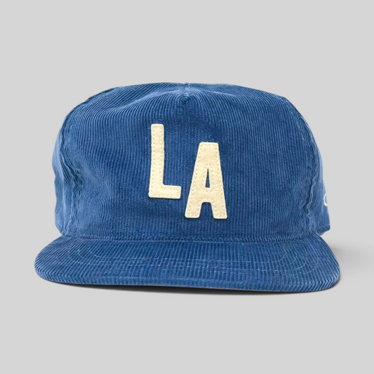 KILLER RETRO blue corduroy snapback hat with vintage cream felt LA applique and unstructured design