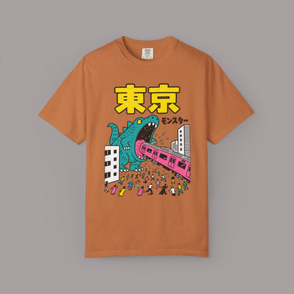 KILLER RETRO heavyweight cotton t-shirt in burnt orange featuring a teal kaiju monster attacking a Tokyo city scene.