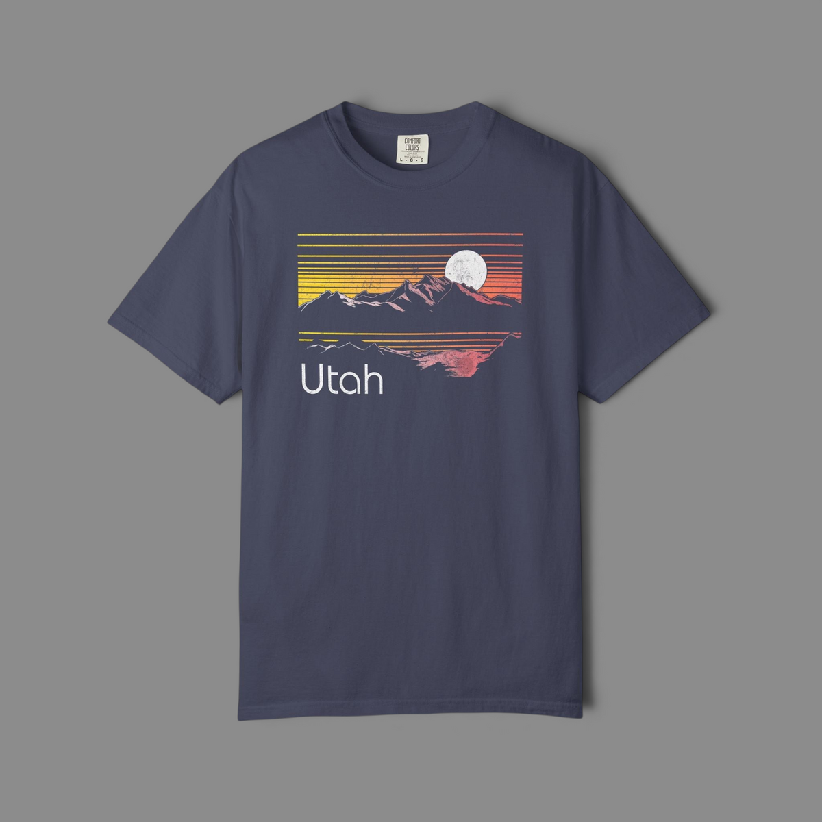 KILLER RETRO navy blue heavyweight cotton t-shirt featuring a vintage Utah mountain sunset graphic with a moon.