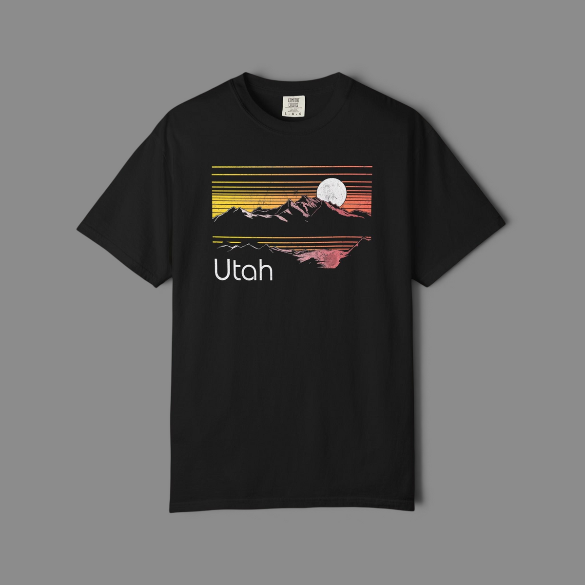 KILLER RETRO black heavyweight cotton t-shirt featuring a vintage Utah sunset and mountain graphic with a full moon.