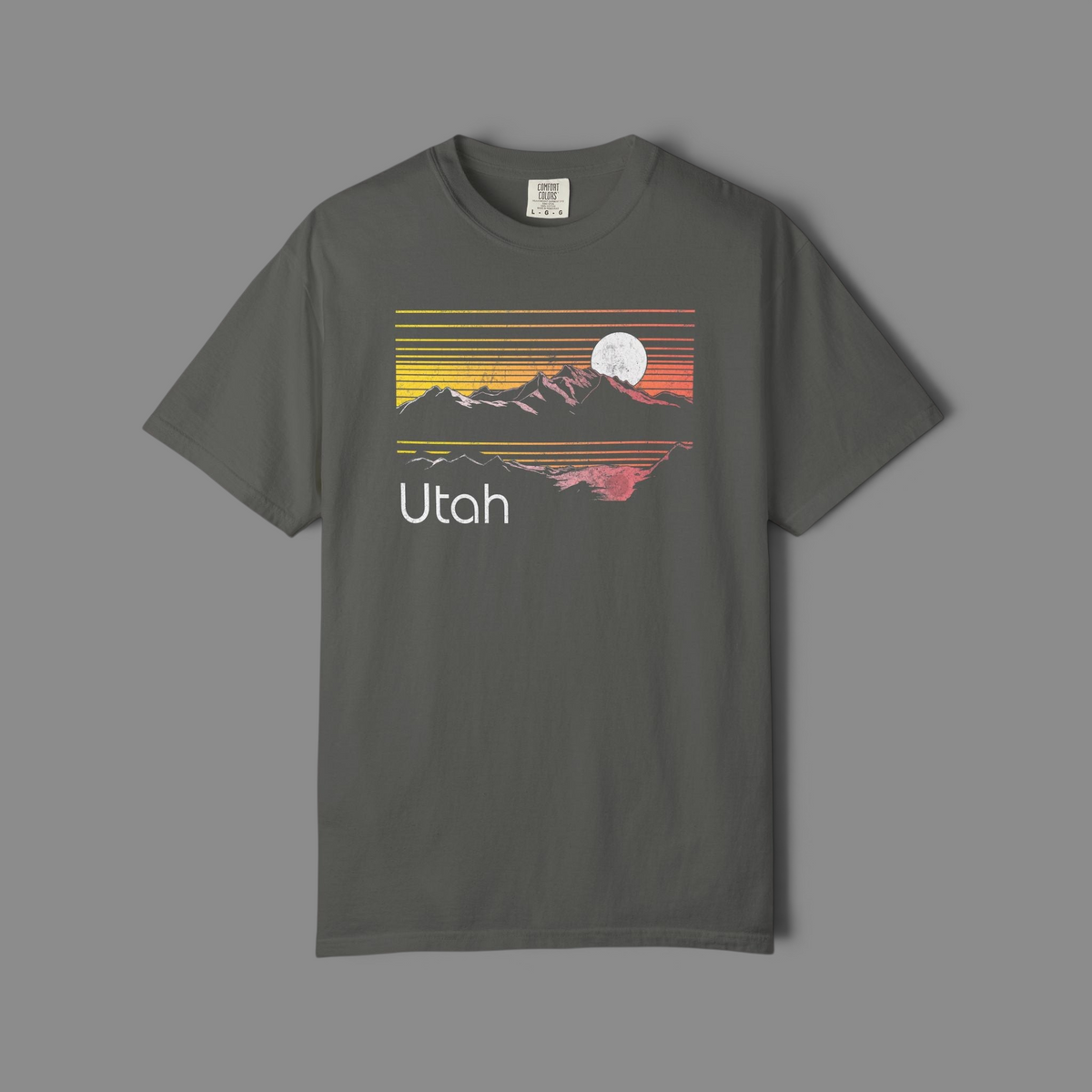KILLER RETRO charcoal grey heavyweight cotton t-shirt featuring a vintage Utah sunset mountain and moon graphic.