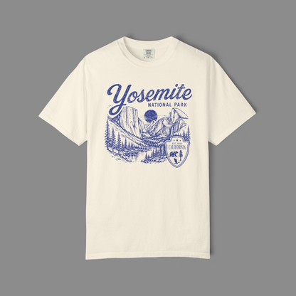 KILLER RETRO cream garment-dyed cotton t-shirt featuring a vintage blue Yosemite National Park graphic print